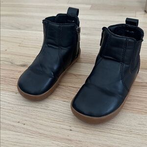 Ten Little Chelsea boot in black with brown rubber sole. Toddler size 10